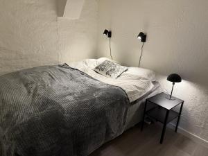 Postel nebo postele na pokoji v ubytování Modern familjelägenhet