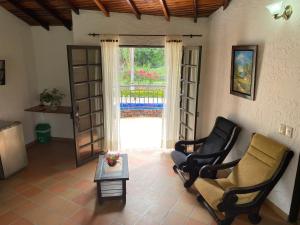 Posezení v ubytování RANCHO SAN LUIS, Páramo