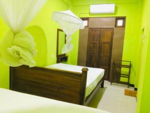 Voodi või voodid majutusasutuse Hostel Ambel toas