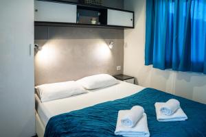 Ένα ή περισσότερα κρεβάτια σε δωμάτιο στο Murter Sunny House