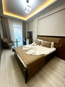 Katil atau katil-katil dalam bilik di Grand Diamond Hotel