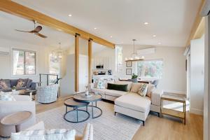 a living room with a couch and a table at Towering Pine in Incline in Incline Village