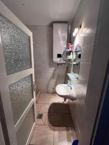 A bathroom at Abigél Apartman