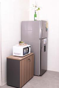 Dapur atau dapur kecil di Stylish Comfort 1BR Apartment in North Legon