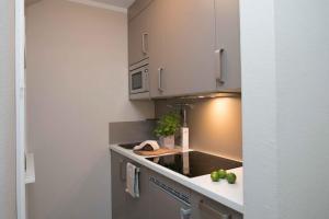 Η κουζίνα ή μικρή κουζίνα στο Gästehaus Orion - Wohnung 2 +7 φωτογραφίες