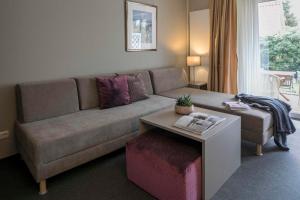 Posezení v ubytování Gästehaus Orion - Wohnung 8