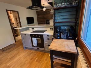 Kuchyň nebo kuchyňský kout v ubytování Charmant appartement avec parking - 37m² - FR-1-692-77