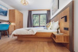 Ένα ή περισσότερα κρεβάτια σε δωμάτιο στο Hotel Bad Neunbrunnen am Waldsee - non Halal