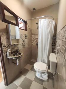 a bathroom with a toilet and a sink at El Silencio 2 - Quebrada - Lozano - Yala - Jujuy in Lozano