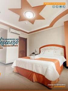 Postel nebo postele na pokoji v ubytování BRITNEY HOTEL Machala