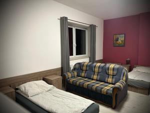 Łóżko lub łóżka w pokoju w obiekcie Hostel Sportowa
