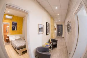 Postel nebo postele na pokoji v ubytování Rooms Boutique Carducci