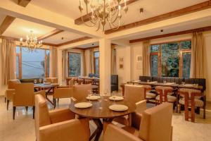 Posezení v ubytování The Panorama Retreat, Manali