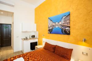 Kuchyň nebo kuchyňský kout v ubytování Rooms Boutique Carducci