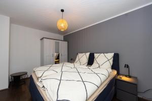 Postel nebo postele na pokoji v ubytování Fuldaer Residenz