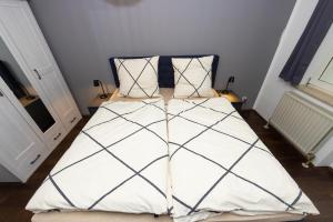Postel nebo postele na pokoji v ubytování Fuldaer Residenz