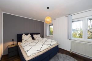 Postel nebo postele na pokoji v ubytování Fuldaer Residenz