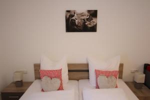 Postel nebo postele na pokoji v ubytování Monika-Mellau Appartements