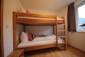 Postel nebo postele na pokoji v ubytování Monika-Mellau Appartements
