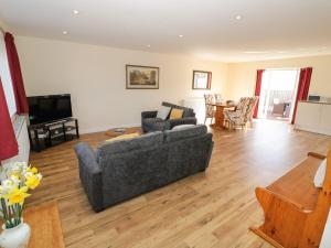 Et opholdsområde på Walnut Cottage