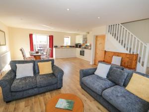 Et opholdsområde på Walnut Cottage