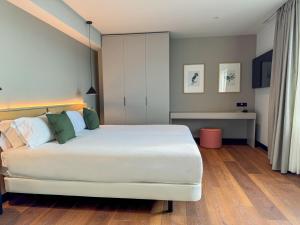 Кровать или кровати в номере Hotel Bahía de Vigo