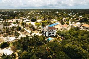 an aerial view of a city with a resort at Zanoceanique Hotel in Matemwe