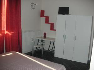 Ένα ή περισσότερα κρεβάτια σε δωμάτιο στο House Volumnia +1 φωτογραφίες
