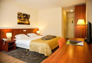 En eller flere senger på et rom på Hotel-Restaurant Ruyghe Venne