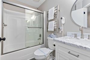 a bathroom with a shower and a toilet and a sink at Laurelwood 44 with Wintergreen Advantage in Wintergreen +12 photos