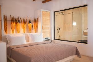 Postel nebo postele na pokoji v ubytování ARC suites