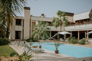 Bazén v ubytování Hotel Boutique Hort de Nal nebo v jeho okolí