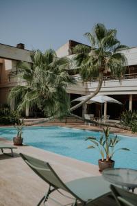 Bazén v ubytování Hotel Boutique Hort de Nal nebo v jeho okolí