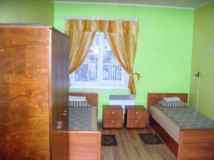 Cama o camas de una habitación en Kagu Hostel