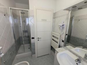 Koupelna v ubytování Mia Domus Guest Holiday + 16 fotografií