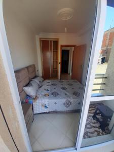 Postel nebo postele na pokoji v ubytování Appartement à Martil 10 min de la plage