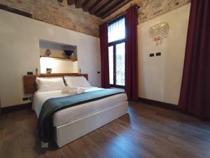 Posteľ alebo postele v izbe v ubytovaní Gradenigo Apartments 767