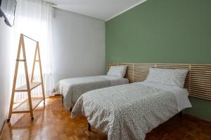 Postel nebo postele na pokoji v ubytování Casa Genny