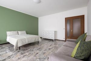 Postel nebo postele na pokoji v ubytování Casa Genny