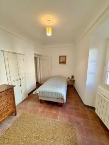 Postel nebo postele na pokoji v ubytování Évasion Authentique à Èze, avec vue Mer