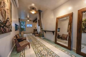 Posezení v ubytování Hotel Kuxtal