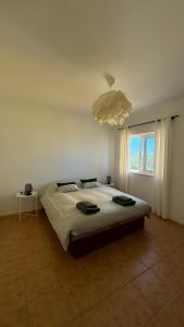 Giường trong phòng chung tại vila pinheiro +58 ảnh