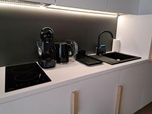 Kuchyňa alebo kuchynka v ubytovaní MK Apartamenty Morski