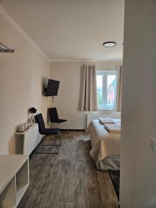 Μια τηλεόραση ή/και κέντρο ψυχαγωγίας στο Medelby Inn