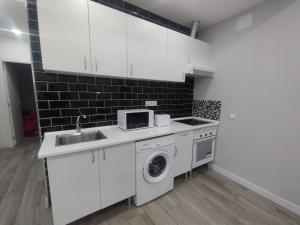 Kuchyň nebo kuchyňský kout v ubytování Apartamento HM en Vista Alegre Madrid