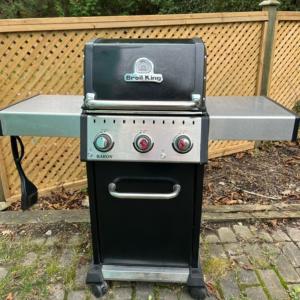 a grill with a table on top of it at Riverside Retreat with Sauna & Hot Tub in Elora in Elora +28 photos