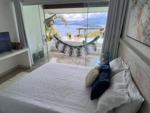 Postel nebo postele na pokoji v ubytování Pousada Sonho Real