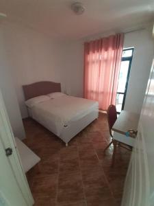 Postel nebo postele na pokoji v ubytování Villa-Hotel Ludianna