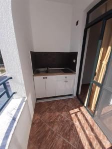 Kuchyň nebo kuchyňský kout v ubytování Villa-Hotel Ludianna