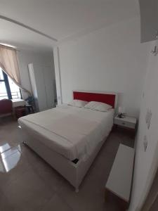 Postel nebo postele na pokoji v ubytování Villa-Hotel Ludianna